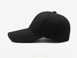 Detail view of the black sports baseball cap featuring embroidered SPORT logo on side