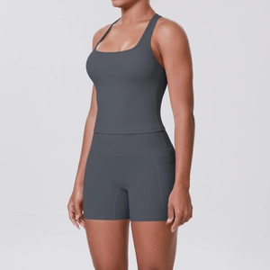 Detail of high-waist yoga shorts in dark grey with functional side phone pocket