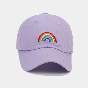 Close-up of rainbow embroidery on lavender cotton twill baseball cap with fine stitching