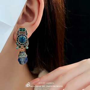 Vintage long drop earrings with blue crystal inlay and gold finish for women