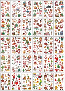 Grid layout of 30 cute cartoon Christmas tattoo stickers with Santa and reindeer designs