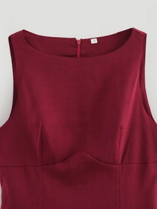 Detail of wine red sleeveless dress neckline showing fabric texture and S size label