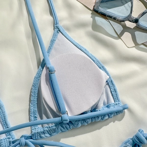 Detail of light blue waffle texture bikini with removable white padding and soft lining