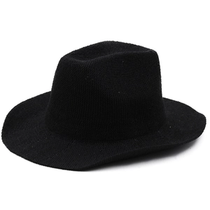 Detailed view of the black woven texture and structured crown of the Panama fedora hat