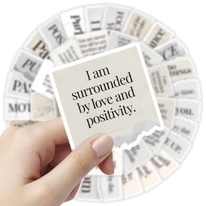 Set of 80 retro inspirational stickers with torn edges and positive quotes for laptops