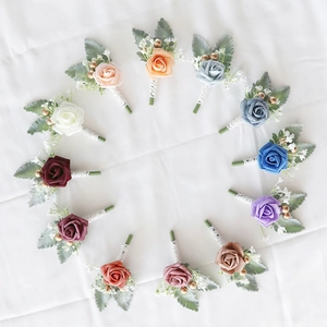 Set of 12 elegant artificial rose boutonnières in assorted colors for wedding guests