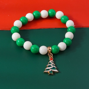 Christmas beaded bracelet featuring green and white pearls with an alloy tree charm
