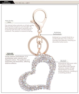 Detail of gold heart keychain with sparkling AB rhinestones and secure lobster clasp