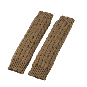 Detailed view of brown cable-knit leg warmers in a classic autumn winter style