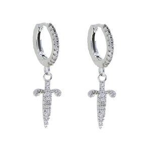 Detail shot of silver sword earrings with shimmering white zircon stones for men