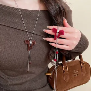 Retro Flocked Bow Pendant Necklace With Zircon Copper Long Sweater Chain For Women Elegant Jewelry