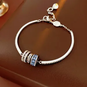 Elegant silver bracelet with zircon round letter beads and blue square gemstones