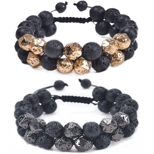 Detail of adjustable double-layer woven bracelets with black volcanic stones and metal beads