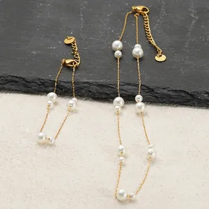 Ensemble élégant collier et bracelet en acier inoxydable doré et perles d'eau douce