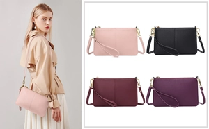 Close-up of pebble grain PU leather crossbody phone bag with gold metal hardware details
