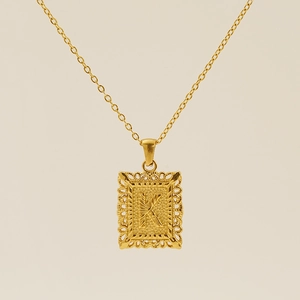 Gold plated square pendant necklace with vintage letter K engraving and patterned border