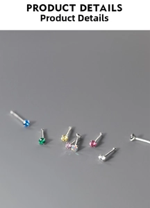 Macro detail of multi-color four-claw cubic zirconia studs in 999 sterling silver