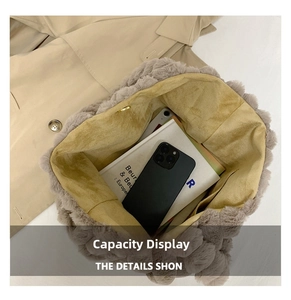 Top view of plush striped tote bag showing spacious interior with books and phone
