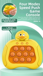 Detail of the back confirmation button on a duck-shaped quick push handheld game console