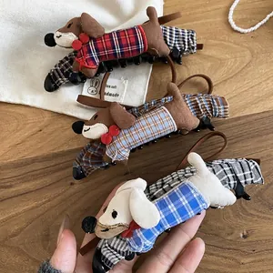 Handmade fabric dachshund dog hair clips with plaid patterns and cute bowknot detail