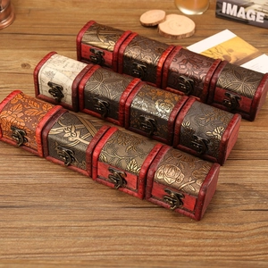 Set of four vintage wood jewelry storage boxes with floral embossed metal and buckles