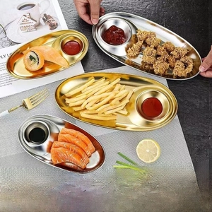 Detail of 304 stainless steel serving platter with sauce dip compartment and gold finish