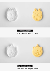 Detail view of cat and deer shaped Christmas cookie cutters with 5x6.2cm dimensions