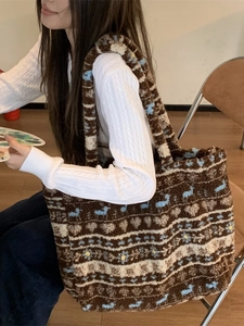 Retro plush tote bag with colorful heart patterns shown as a casual shoulder bag