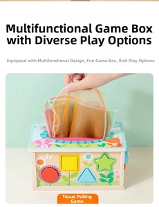 Detail view of wooden busy box toy featuring shape sorting and tissue box play