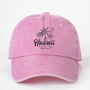 Detailed view of pink washed cotton baseball cap with black Hawaii palm tree island print
