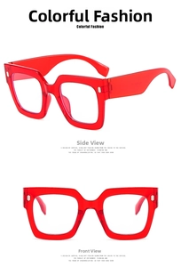 Detail view of red transparent square oversized frame glasses showing front and side angles