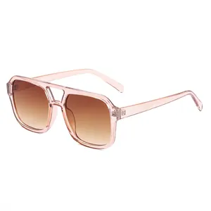 Vintage pilot square sunglasses with light pink frame and brown gradient lenses