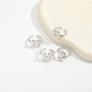 Minimalist silver adjustable letter rings G, M, H, B with bubble metal design