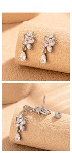 Macro detail of butterfly ear stud with zircon inlay and screw flat back design