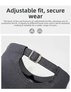 Close-up of adjustable metal buckle on gray cotton baseball cap for a custom fit