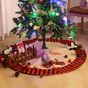 Classic Christmas tree skirt with red truck embroidery and buffalo plaid border
