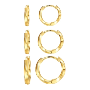Three pairs of stylish gold twisted hoop earrings in graduated sizes for women