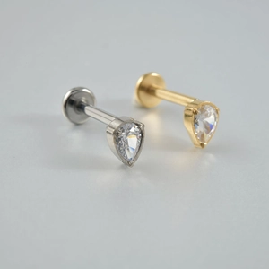 G23 titanium labret studs with teardrop CZ stones in silver and gold finish