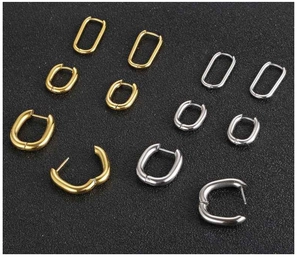 U-shaped gold and silver stainless steel hoop earrings in four different sizes
