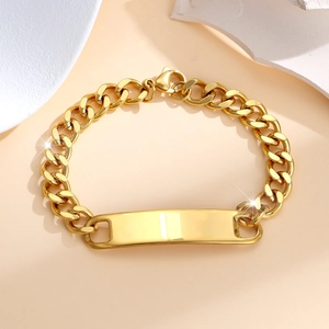 Polished gold cuban link bracelet with a blank engravable rectangular plaque detail