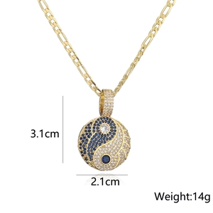 Gold 18K plated Yin Yang pendant necklace with blue and white zircon on white background