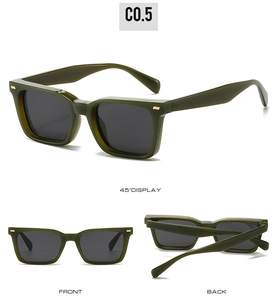 Detail of dark olive green square sunglasses with metal rivets and gray tinted lenses