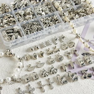 Y2K silver alloy charms set with mixed shapes in a storage box for DIY jewelry making