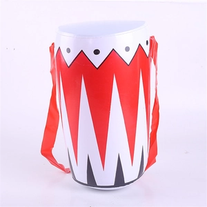 Detailed view of red and white inflatable PVC drum toy with adjustable shoulder straps