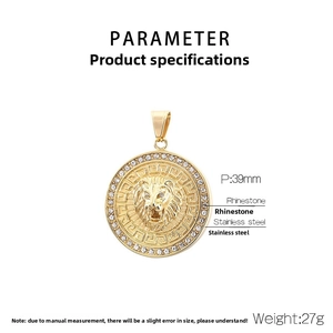 Detail of gold lion head medallion with Greek key pattern and sparkling crystals