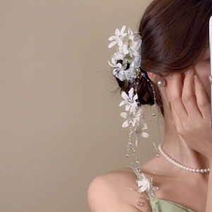 Exquisite white fabric floral hair clip with delicate lace and long pearl tassel details
