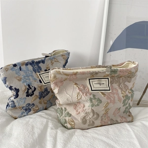 Floral embossed cosmetic bag with jacquard embroidery and large capacity storage pouch
