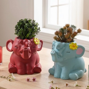 Cute cartoon elephant resin succulent planters in red and blue colors for home decor