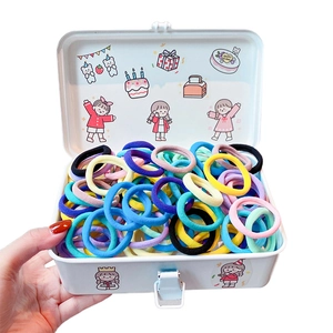 Set of 50 colorful high-elastic seamless hair ties in a cute white tin storage box