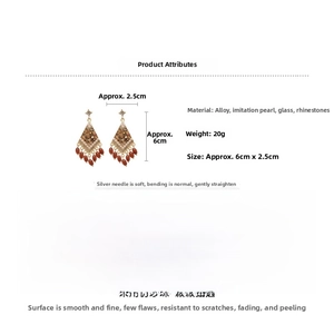 Detail view of sparkling diamond rhombic crystal tassel earrings with dimensions 6cm x 2.5cm